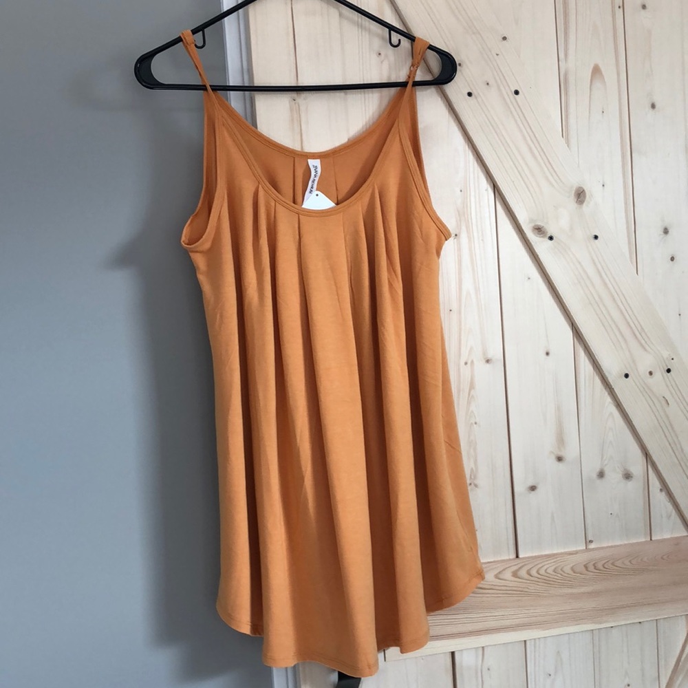 Mustard colored tunic tank. New with tags.